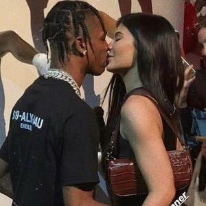 Brown faux crocodile leather purse